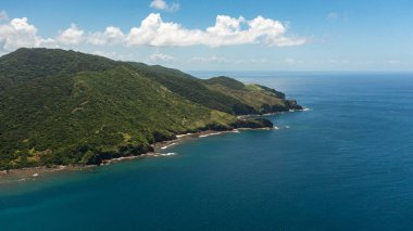 Top view of coast of the island with beaches and rainforest. Cape Engano. Palaui Island. Santa Ana Philippines.