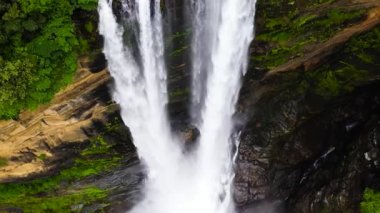 Waterfall in the rainforest, jungle. Aerial drone of Laxapana Falls, Sri Lanka