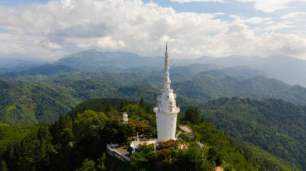 Ambuluwawa Tower is a temple of four religions in Sri Lanka. The tower rises above the jungle on a high mountain.