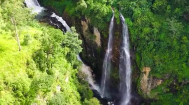 A beautiful waterfall among the rainforest and vegetation. Sri Lanka.Puna Ella Falls.