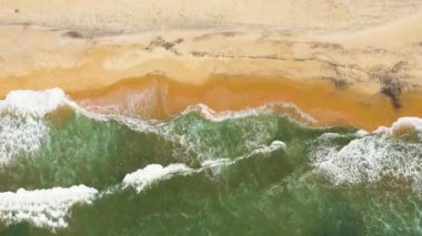 Beautiful sandy beach and sea surf with waves. Sri Lanka.