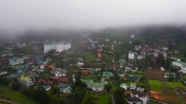 Houses and buildings on the slopes of the mountains in the town of Nuwara Eliya. Sri Lanka.