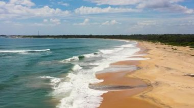 Aerial view of Tropical sandy beach and blue sea. Sri Lanka.