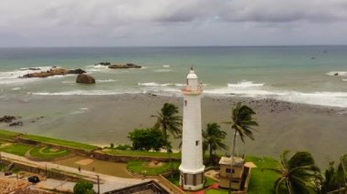 Aerial view of Lighthouse and the mosque of sea fortress in Galle Fort. Sri Lanka.
