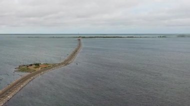 Aerial drone of Sangupiddy Bridge is a road bridge across Jaffna Lagoon in northern Sri Lanka.