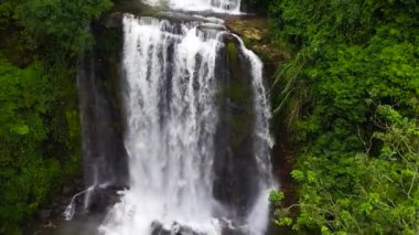 Waterfall in a mountain canyon surrounded by jungle. Mount Vernon, Sri Lanka.