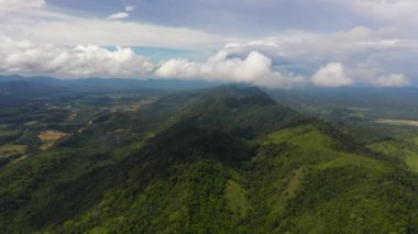 Mountain slopes covered with rainforest and jungle. Sri Lanka. View of the valley in the mountain province.