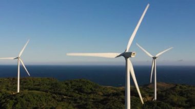 Aerial view of Group of windmills for renewable electric energy production. Wind Power Station. Philippines.