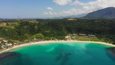 Aerial view of Blue lagoon with sandy beach. Pagudpud, Ilocos Norte, Philippines.