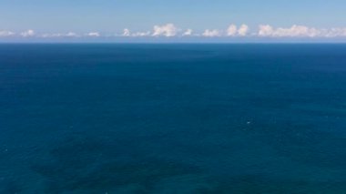 Flight over the sea. Blue sea and sky.