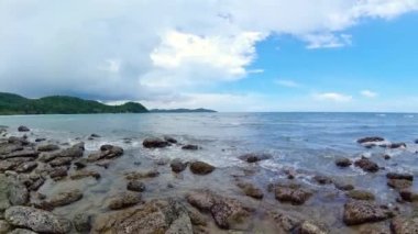 Rocky coast and sea surf. Borneo, Malaysia. Kalampunian Beach.