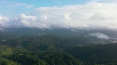 Tropical mountain range and mountain slopes with rainforest. Philippines.