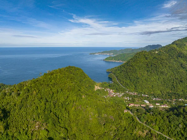 stock image Aerial drone of coast of Sumatra with towns and mountains with jungle. Indonesia.