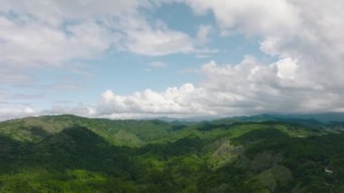 Tropical mountain range and mountain slopes with rainforest. Philippines.