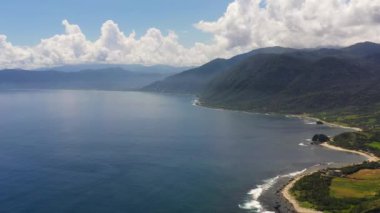 Coast and mountains with forest and jungle.Tropical landscape. Pagudpud, Ilocos Norte, Philippines.