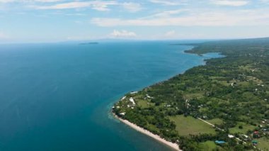 Top view of coastline of Negros island and blue sea. Seascape: Ocean and blue sky. Philippines.