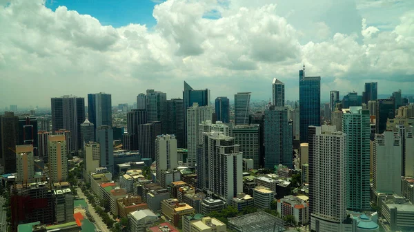 stock image Manila city, the largest metropolis of Asia with skyscrapers and modern buildings, view from above. Travel vacation concept.