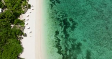 Aerial drone of tropical sandy beach and blue sea. Bantayan island, Philippines.