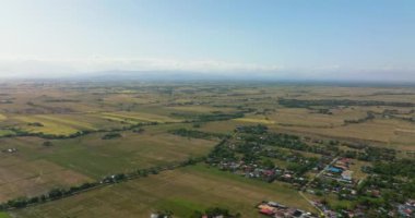 Aerial view of Rice fields and agricultural land in the countryside. Philippines.