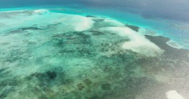 Summer seascape beautiful waves, blue sea water in sunny day. Top view from drone. Sea aerial view, amazing tropical nature background.