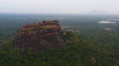 Aerial view of Sigiriya Rock or Lion Rock near Dambulla in Sri Lanka. Green rainforest and jungle.