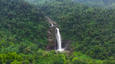 Aerial drone of Aberdeen waterfall in a mountain gorge in the tropical jungle. Sri Lanka.