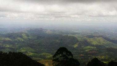 Mountain slopes covered with rainforest and jungle. Sri Lanka. View of the valley in the mountain province.