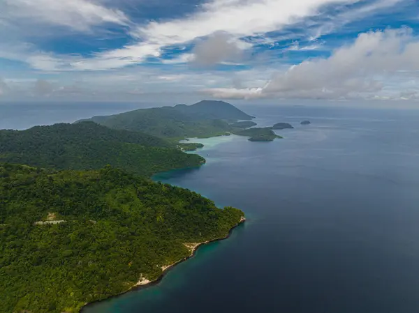 Aerial drone of coast of Weh island with rainforest and jungle. Aceh, Indonesia.