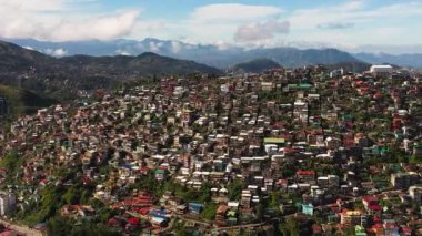 Top view of Baguio City with colorful houses in a mountainous province. Philippines, Luzon.