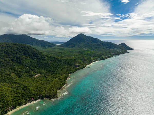 Weh island with jungle and rainforest view from above. Seascape in the tropics. Aceh, Indonesia.