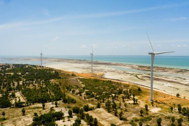 Group of wind turbines on the coastline. Jaffna, Sri Lanka. Wind power plant.