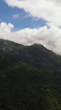 Aerial view of Tropical mountain range and mountain slopes with rainforest. Sri Lanka.