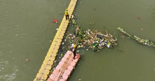 Aerial Drone Workers Floating Garbage Trap Clear River Debris Jakarta — Stock Video