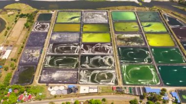 Aerial view of Pump ponds at a shrimp farm in the Philippines.Prawn farm with aerator pump.