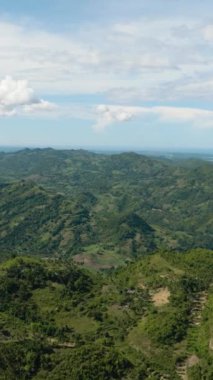 Aerial drone of mountains and hills with vegetation in the tropics. Negros, Philippines