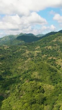 Aerial view of Mountain slopes covered with rainforest and jungle. Negros, Philippines