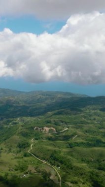 Aerial view of countryside with agricultural land in the mountains. Libo hills. Cebu island, Philippines.
