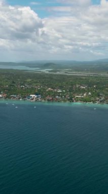 Aerial drone of coast of Moalboal with hotels and dive centers. A popular place for divers. Philippines, Cebu.