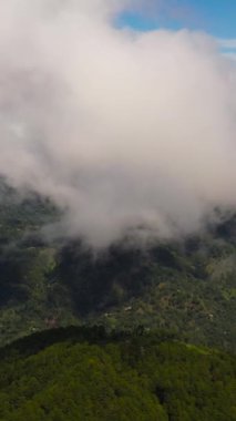 Tropical mountain range and mountain slopes with rainforest. Philippines.