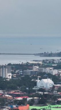 Aerial view of city of Bacolod by the sea. Negros Occidental, Philippines.