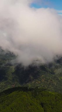Tropical mountain range and mountain slopes with rainforest. Philippines.