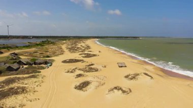 Tropical landscape with a beautiful beach top view. Tropical beach scenery. Kalpitiya, Sri Lanka.