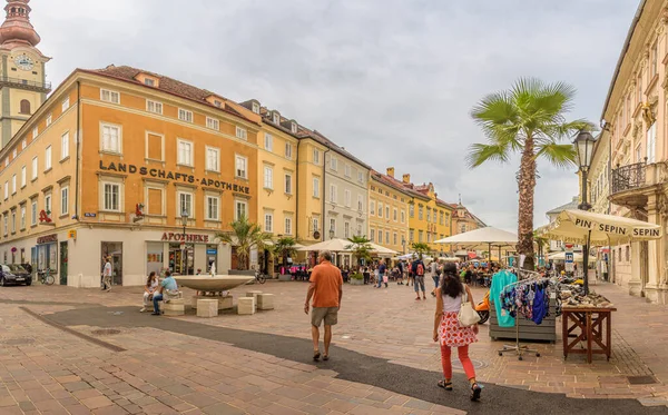 Klagenfurt, Austria - August 8, 2022: Alter Platz (Old Square) in Klagenfurt on a sunny summer day with locals and tourists