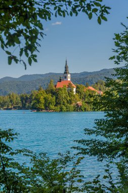 Bled, Slovenia - August 4, 2022: View through to the church on the island of Lake Bled
