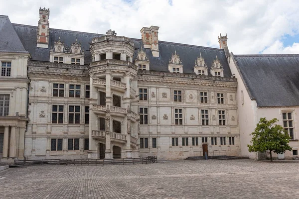 Blois, Loir-et-Cher, Centre-Val de Loire, France  25 May 2022: Courtyard of the Royal Castle of Blois with his famous staircase of the renaissance part of Franois the first