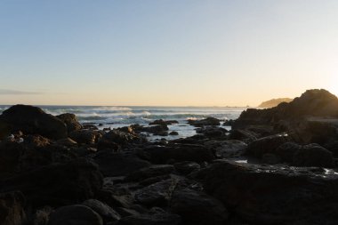 Maunganui Dağı Yeni Zelanda 'nın eteklerinden gün doğumunda doğar..