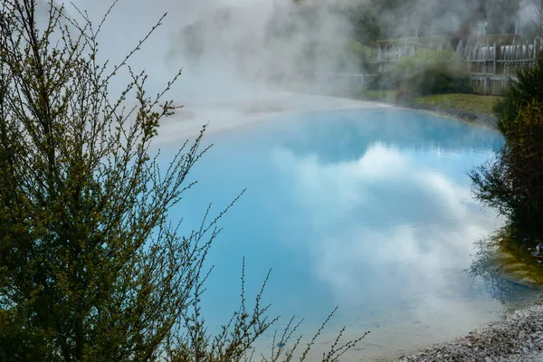 Steaming thermal turquoise hot pool in Volcanic Plateau, North Island of New Zealand.