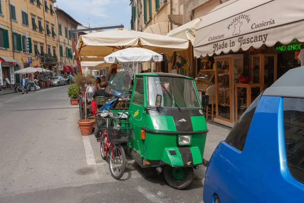 stock image Pisa Italy - April 24 2011; Transportation on Urban streets lined by buildings in Pisa