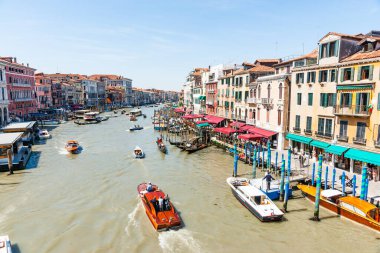 Venice Italy - May 10 2011;  Views of people and boating activity on Grand Canal from Rialto Bridge.