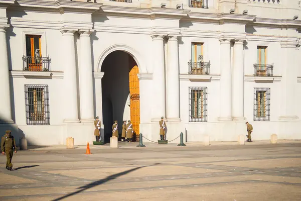 stock image Santiago Chile - June 24 2012; Contrasting architecture of Catholic military church and modern office building .2012; Mounted police on their horses with tourist. 2012; Group of tourists surround two mounted police in public place . 2012; Facade and 